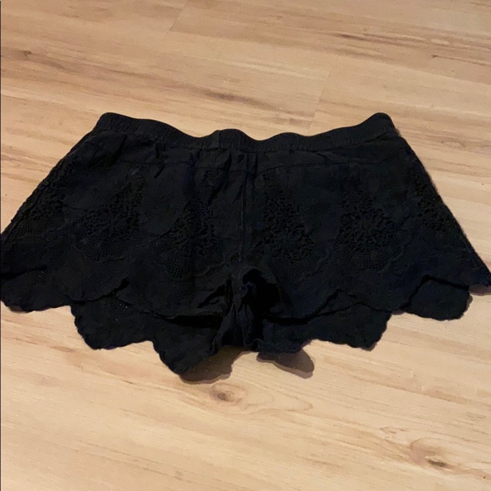 Black scalloped shorts